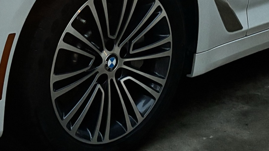Detailed wheel and tire on white BMW in Gainesville GA